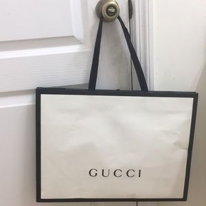 Empty shopping bag of gucchi item .